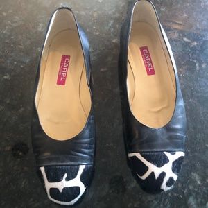 Carel Paris spectator flats.  Black leather with black/cream anima print cap toe